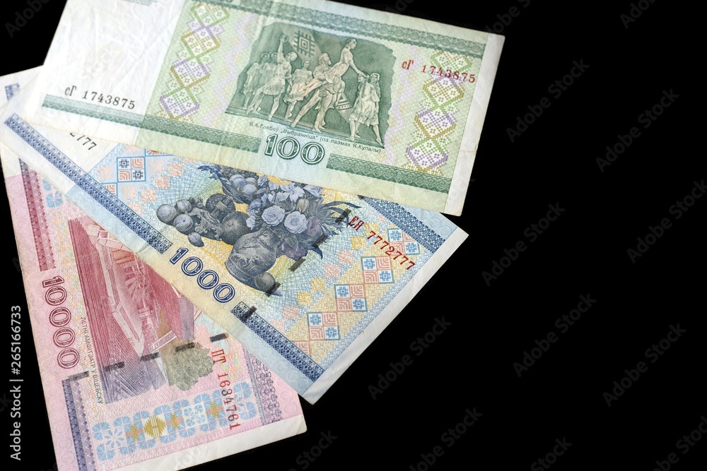Outdated Belarusian rubles isolated on black close up Outdated Belarusian rubles isolated on black close up