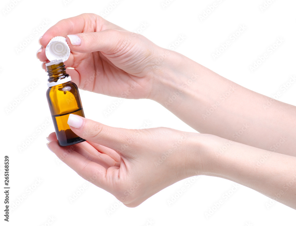 Medicine brown bottle in hand health care on white background isolation Medicine brown bottle in hand health care on white background isolation