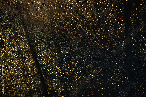 Wallpaper Mural Beautiful rain drops on car glass while heavy traffic jam at night.  Beautiful rain drop on glass background with colorful lighting from a cars and street. Torontodigital.ca