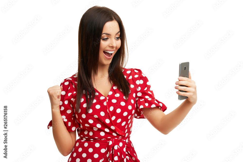 Caucasian brunette woman using smartphone isolated over white background Caucasian brunette woman using smartphone isolated over white background