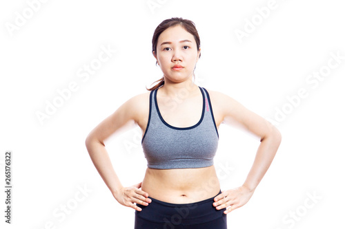 Asian fat woman in sport wear portrait with isolated white background. Fat woman's portrait in sport concept.