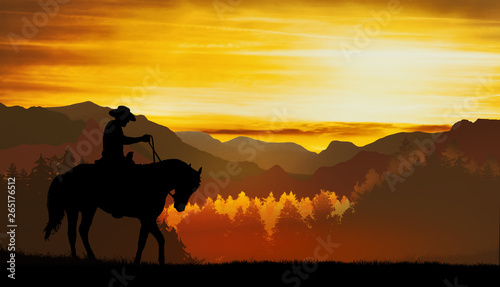 cowboy riding in the hills at sunset © ginettigino