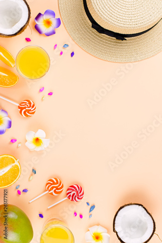 Summer tropical fruits frame on coral color background