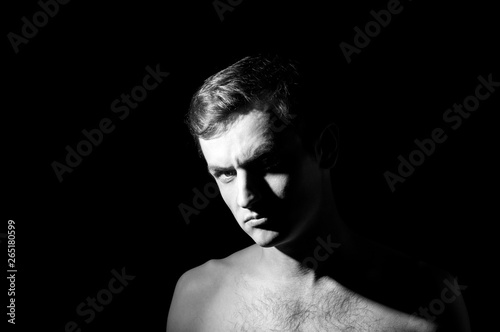 dramatic black and white photo, male portrait, aggressive face © Serhii  Holdin