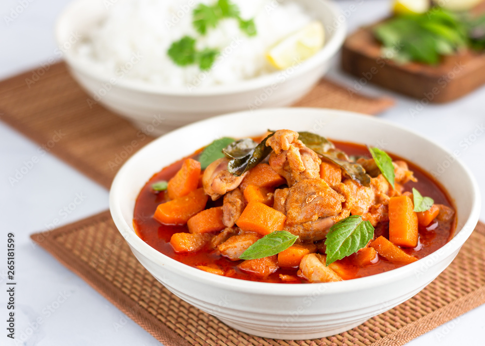 Thai Red Chicken Curry in a Bowl Served with Rice and Lemon. Flavorful Thai Red Curry with Basil Leaves, Thai Cuisine, Oriental Cuisine Photography.. Thai Red Chicken Curry in a Bowl Served with Rice and Lemon. Flavorful Thai Red Curry with Basil Leaves, Thai Cuisine, Oriental Cuisine Photography..