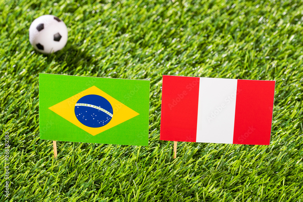 Fototapeta premium Flag of Brazil and Peru at the football stadium - Copa América football tournament conmebol Brazil