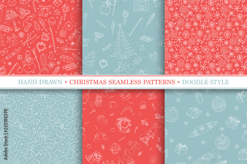 Collection of seamless witner holiday patterns. Christmas vector background with hand drawn elements in doodle style photo