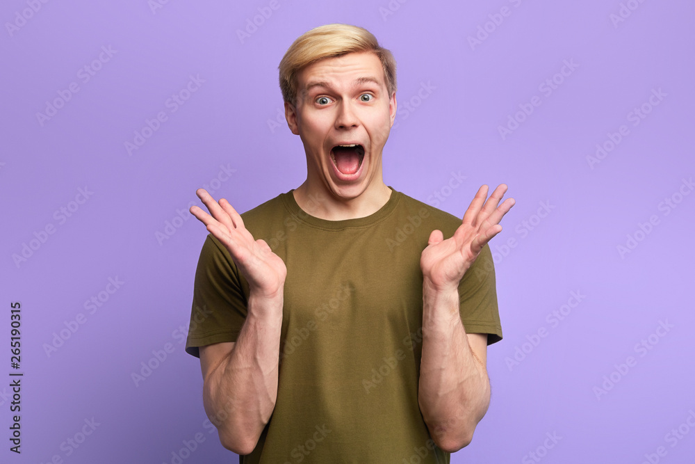funny man with surprsied expression, being scared to hear horrified news,  isolated over blue background. Facial expression. Oh, my goodness, Oh my God  Stock Photo | Adobe Stock