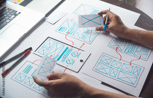 ux Graphic designer creative sketch planning application process development prototype wireframe for web mobile phone . User experience concept.