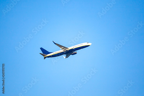 Passenger plane in the blue sky.