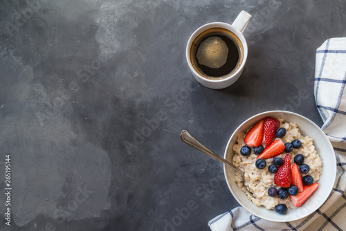 Oatmeal with blueberries and strawberries for breakfast