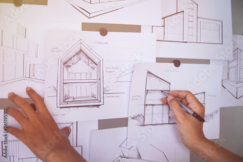Architect Designer Engineer sketching drawing draft working Perspective Sketch design house construction Project