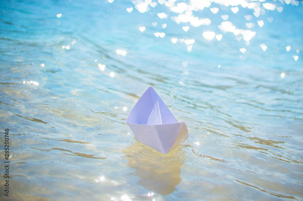 paper boat in the water