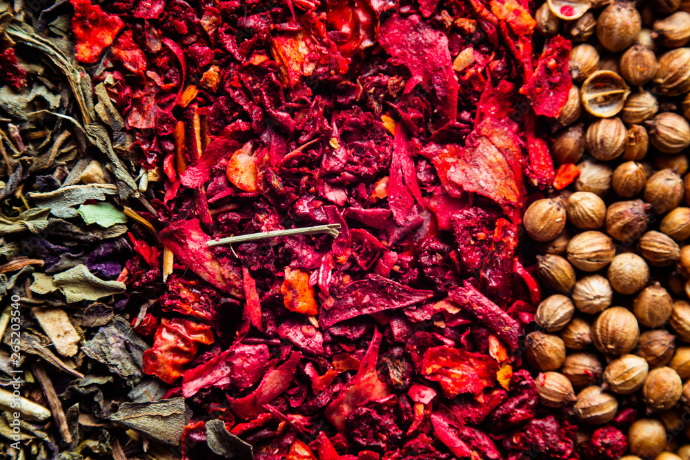 Various colourful spices close up background