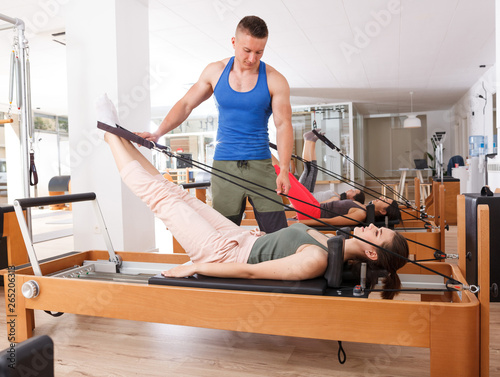 people in the gym with modern fitness equipment