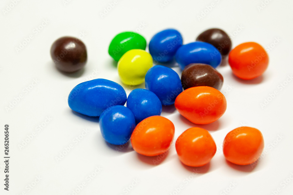 colorful chocolate candies on white background colorful chocolate candies on white background