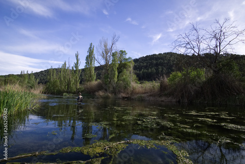 Fototapeta Naklejka Na Ścianę i Meble -  sport fishing in lake