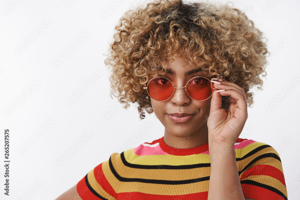 I got it. Portrait of confident attractive dark-skinned female fashion blogger ready take under control friend wardrobe looking like pro at camera touching cool sunglasses and smirking self-assured I got it. Portrait of confident attractive dark-skinned female fashion blogger ready take under control friend wardrobe looking like pro at camera touching cool sunglasses and smirking self-assured