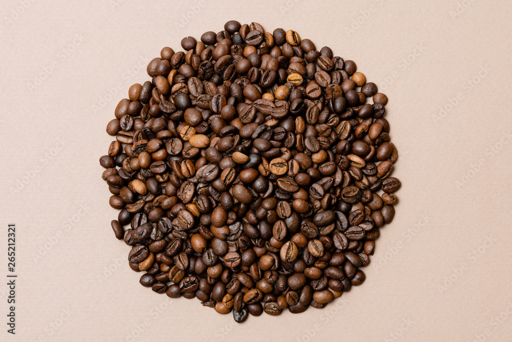 heap of coffee beans on paper background heap of coffee beans on paper background