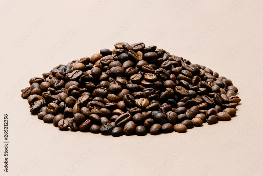 heap of coffee beans on paper background heap of coffee beans on paper background