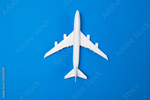 white model on blue background, travel concept