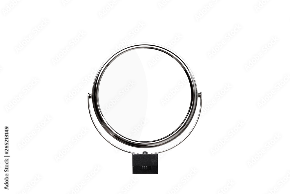 Desktop make up cosmetic mirror isolated on white back. Round turning small mirror in a metal frame. Desktop make up cosmetic mirror isolated on white back. Round turning small mirror in a metal frame.
