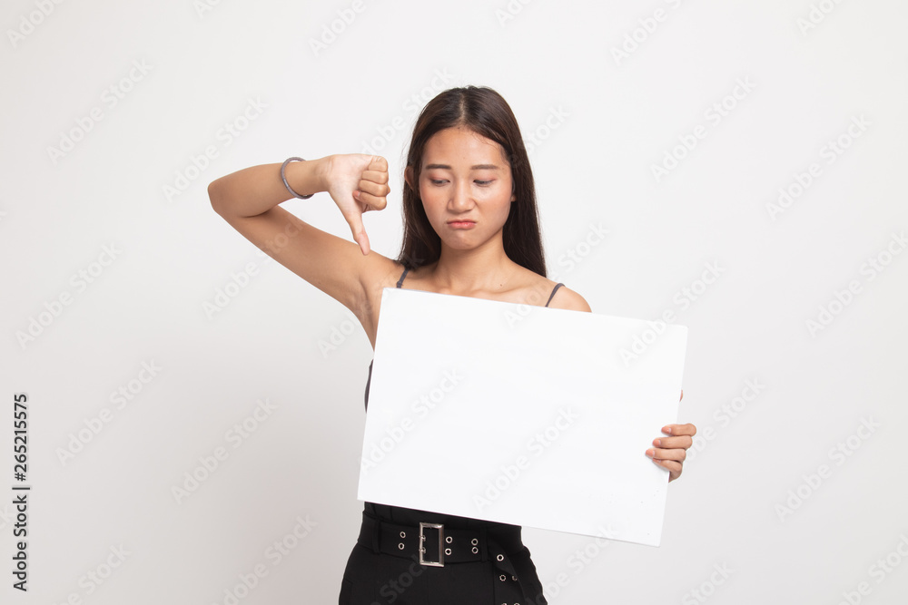 Young Asian woman show thumbs down with white blank sign. Young Asian woman show thumbs down with white blank sign.