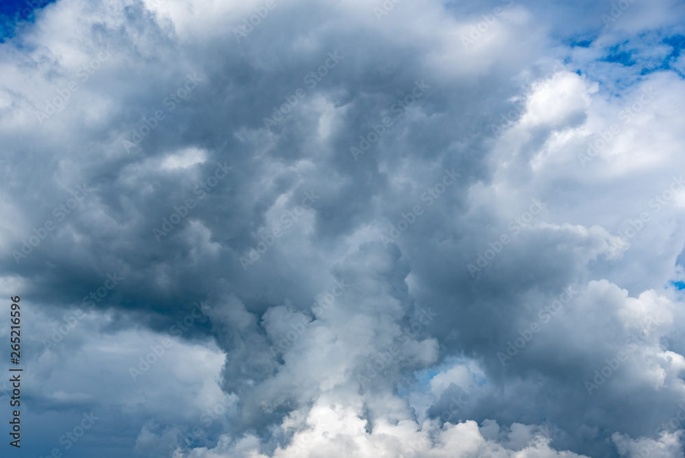 Fototapeta premium Contrast dramatic cloudy sky. The sky with thunder clouds.