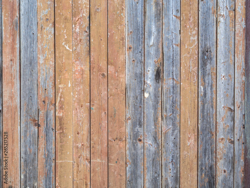 Old wooden wall painted with paint.