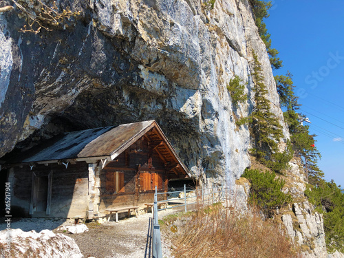 Hermit's houses or Nachgebautes Eremitenhaus (Eremitenhäuschen oder Eremitenhaeuschen) in the Alpstein mountain range and in the Appenzellerland region - Canton of Appenzell Innerrhoden, Switzerland photo
