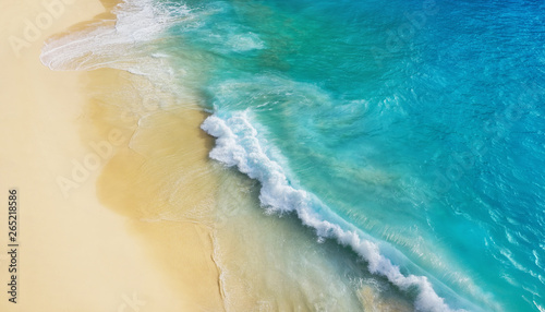 Beach as a background from top view. Waves and azure water as a background. Summer seascape from air. Bali island, Indonesia. Travel - image