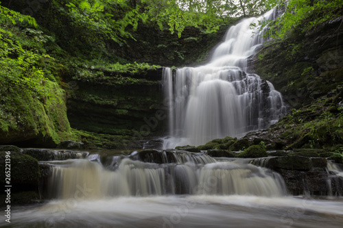 Beautiful waterfall in a forest  Scaleber Force  Yorkshire Dales