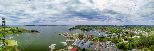 Aerial panorama of shipyard and lighthouse in St. Michaels harbor in Maryland in the Chesapeake Bay
