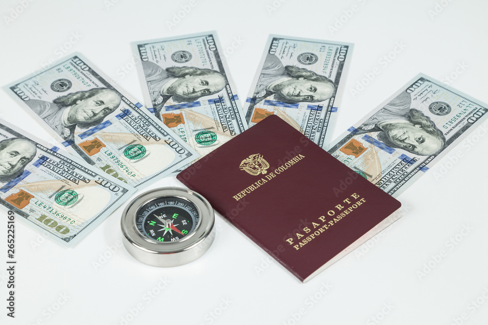 travel concept, Colombian passport with dollar bills for travel abroad travel concept, Colombian passport with dollar bills for travel abroad