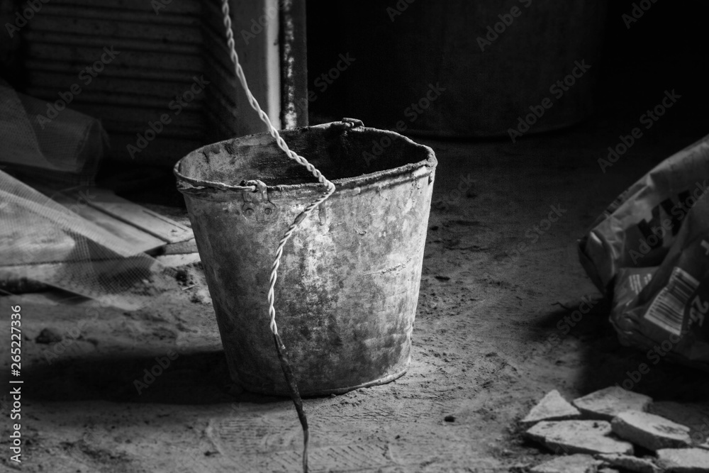 bucket with cement mortar at the construction site bucket with cement mortar at the construction site