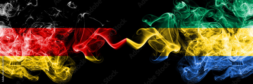 Germany vs Gabon, Gabonese smoky mystic flags placed side by side. Thick colored silky smoke flags of Deutschland and Gabon, Gabonese