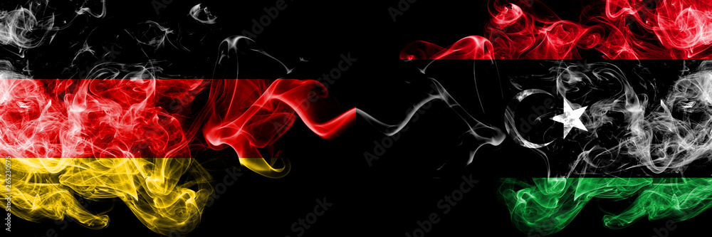 Germany vs Libya, Libyan smoky mystic flags placed side by side. Thick colored silky smoke flags of Deutschland and Libya, Libyan Germany vs Libya, Libyan smoky mystic flags placed side by side. Thick colored silky smoke flags of Deutschland and Libya, Libyan