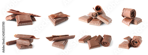 Set of delicious chocolate pieces and curls on white background