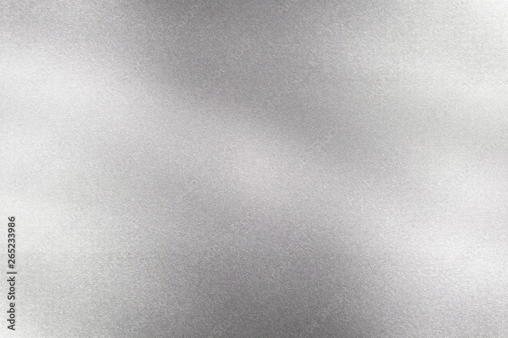Brushed silver wave metallic wall, abstract texture background Brushed silver wave metallic wall, abstract texture background