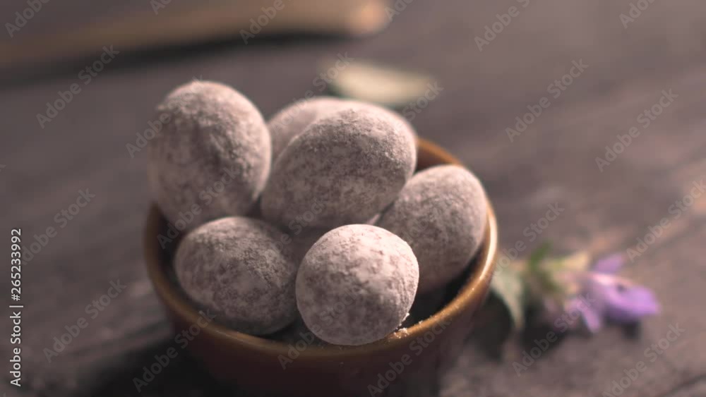 Easter eggs and tea on wooden table top.