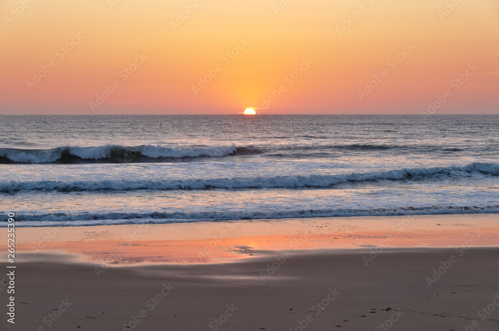 Beautiful Sunset in Areias Brancas beach in Lourinha, Portugal