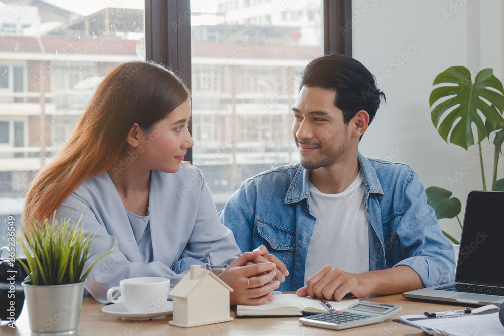 new house / home moving and relocation concept. Happy asian couple talking with apartment landlord from real estate agent / realtor. new house / home moving and relocation concept. Happy asian couple talking with apartment landlord from real estate agent / realtor.