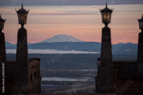 Mt St Helens at sunrise framed by gothic lamp posts in Portland Oregon