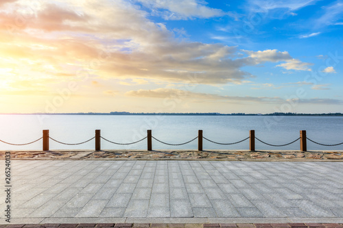 Photography Beautiful lake and walkway with sky clouds at sunset