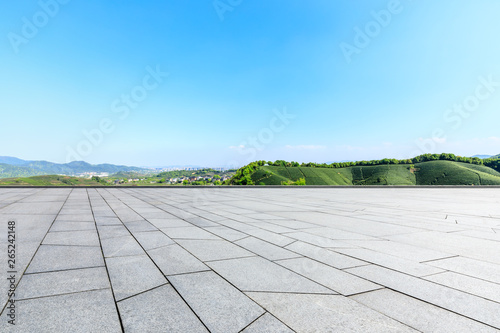 Empty square floor and green mountain natural landscape