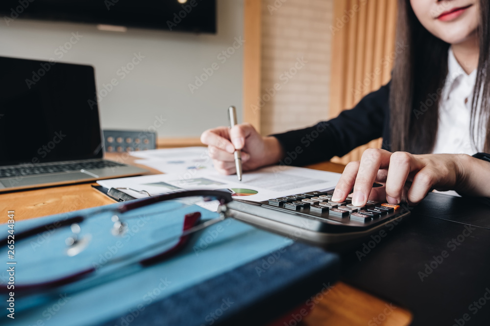 Fototapeta premium Accountant calculate tax information or business data. Businessman working in office