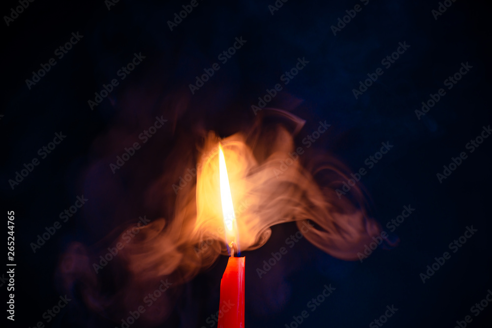Candle flame in the wind. Colored smoke with shining blue and orange gradient. Warm glow texture with fire. Candle flame in the wind. Colored smoke with shining blue and orange gradient. Warm glow texture with fire.