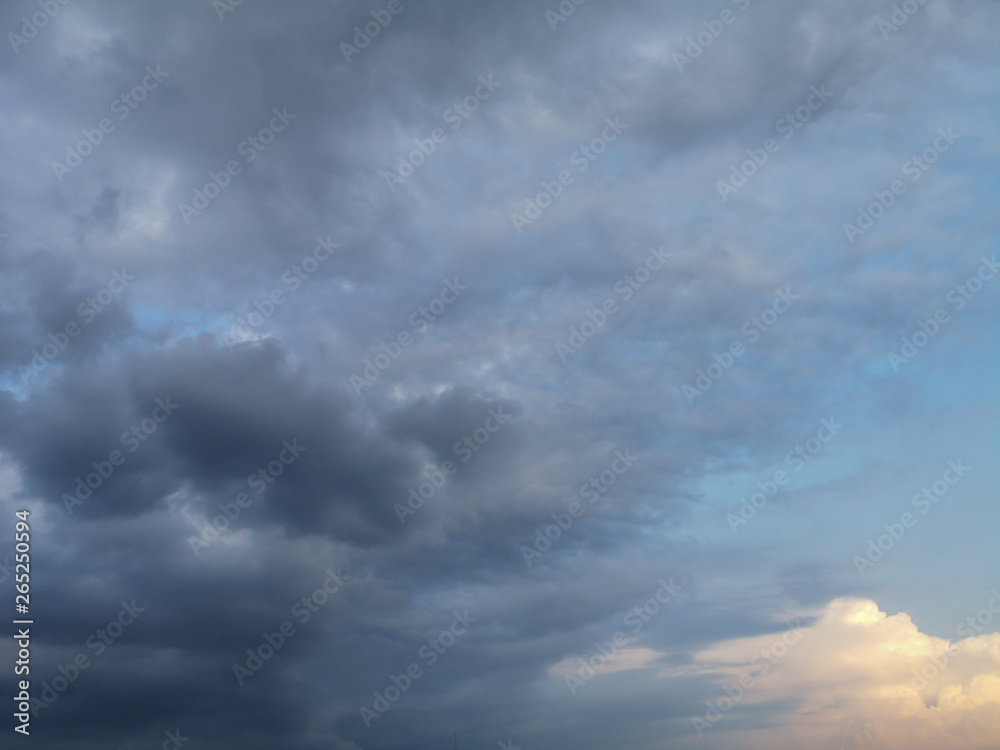 Background of dark and gray clouds in the sky before rain.