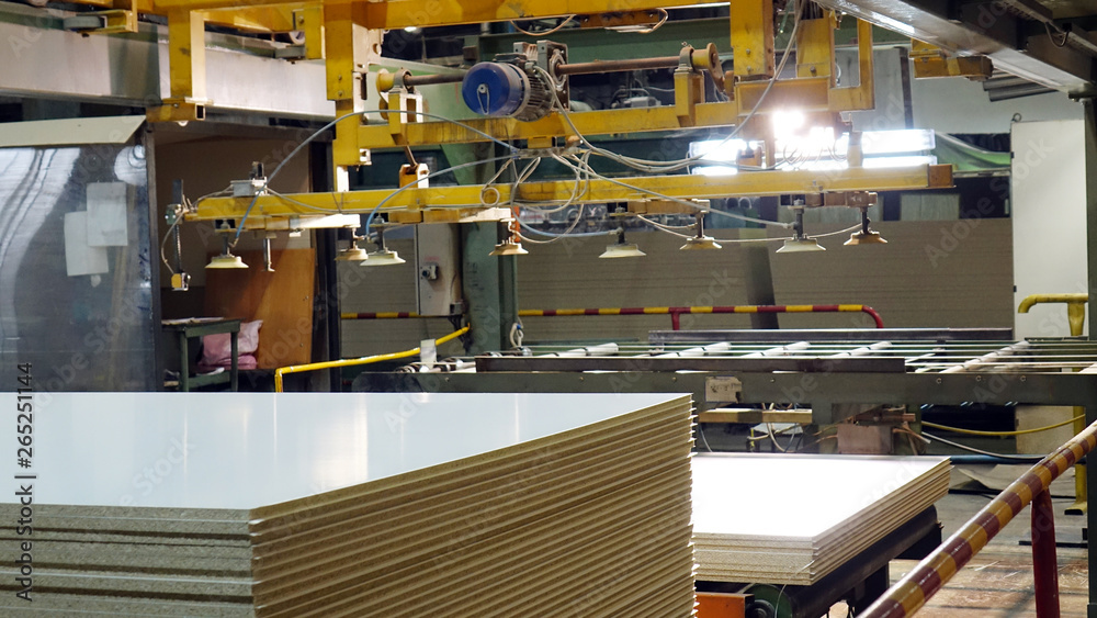 Production of laminated fiberboard. Fibreboard sheets for furniture