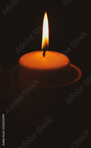 Candle light on dark room